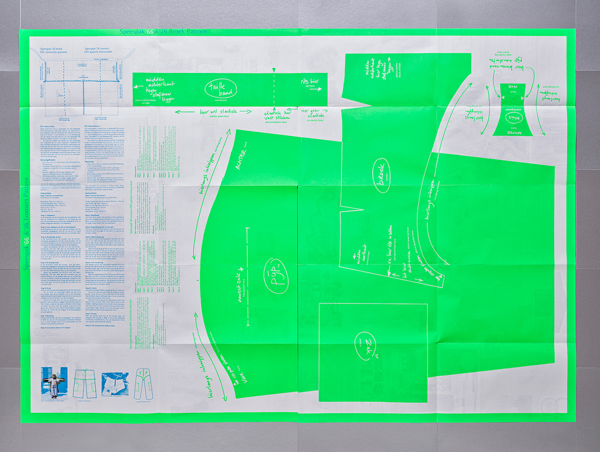 Booklook issue 3: the trousers, publication part 2 unfolded Speespak '66 trousers pattern in fluor green. Photo: Scheltens & Abbenes. Photo: Scheltens & Abbenes.